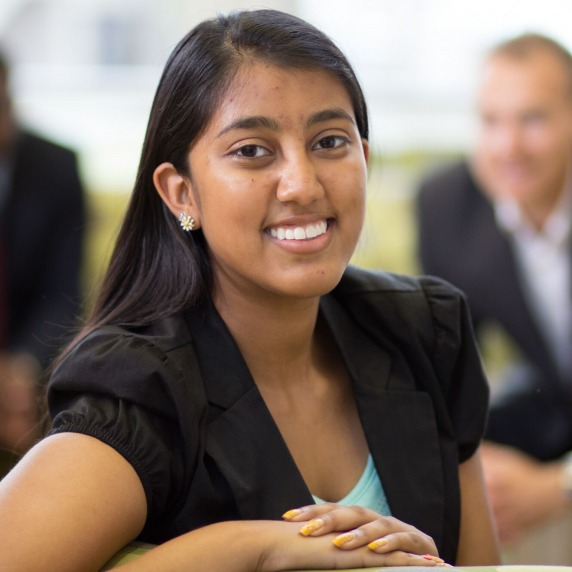 Female business student smiling at camera