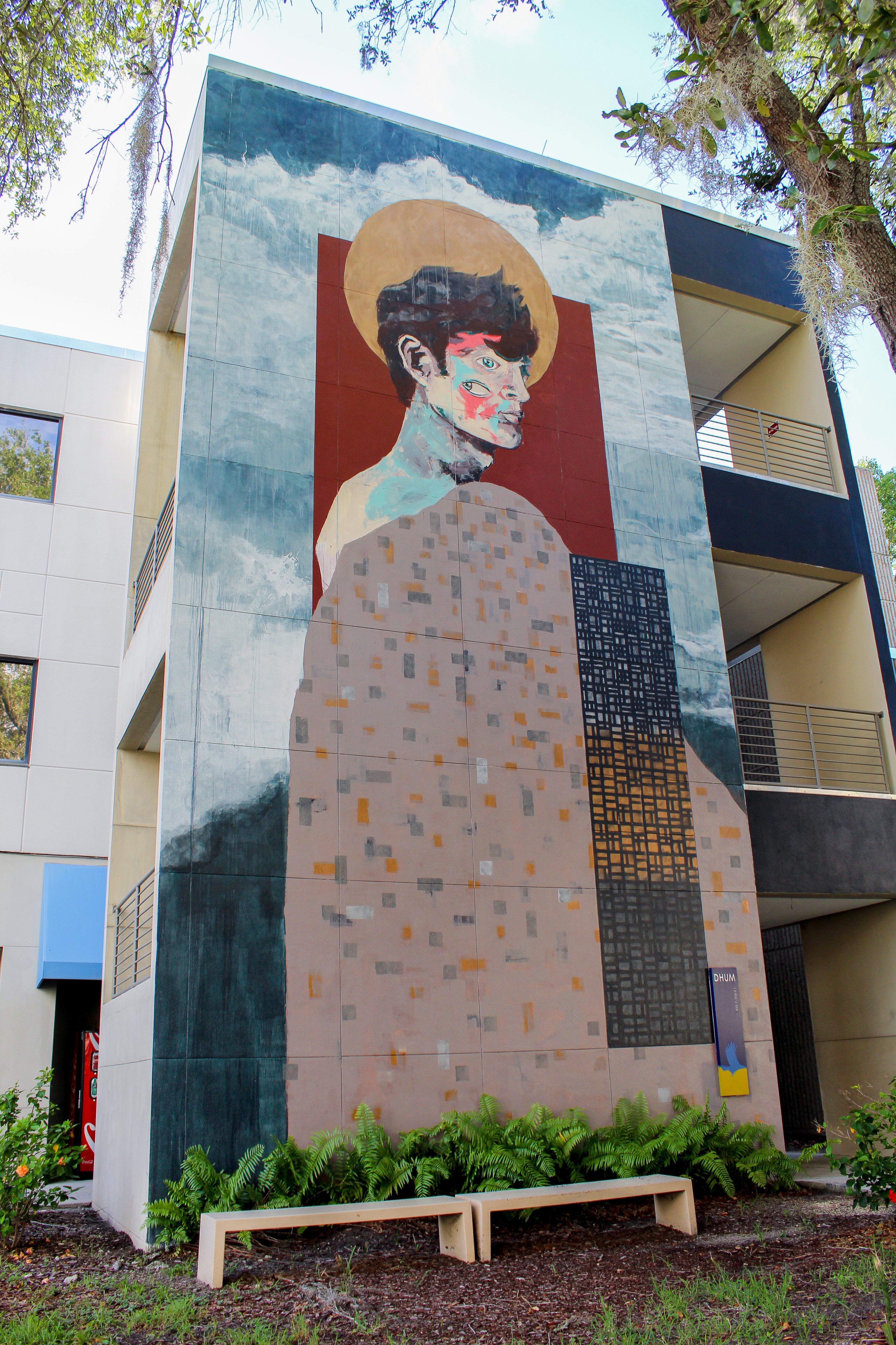 Mural of abstract human with colorful shapes
