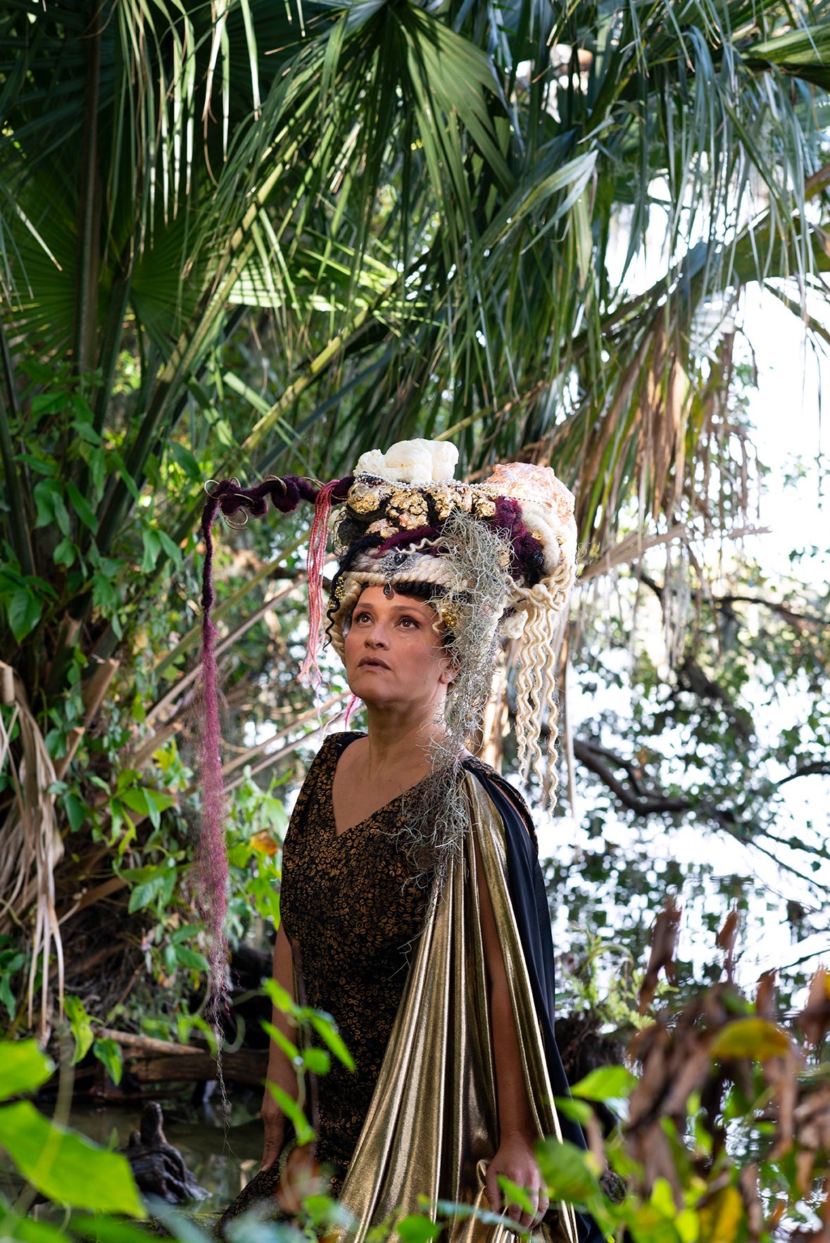 Women in garden with headdress