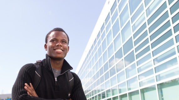 Smiling college male student