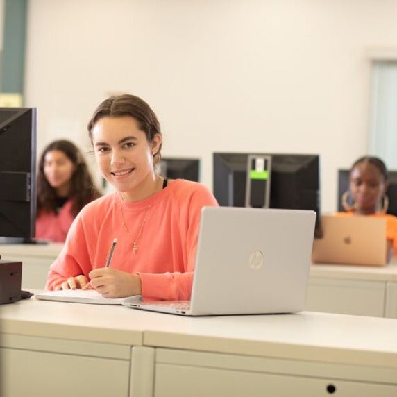 Student at computer desk