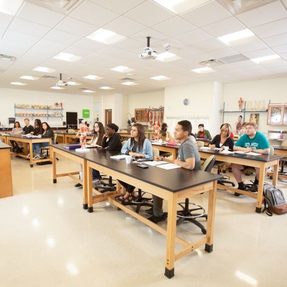 wide view of students during a science lecture in a classroom