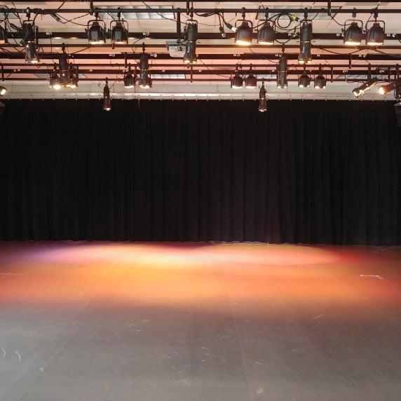 Open stage space to practice dance routines for a performance.