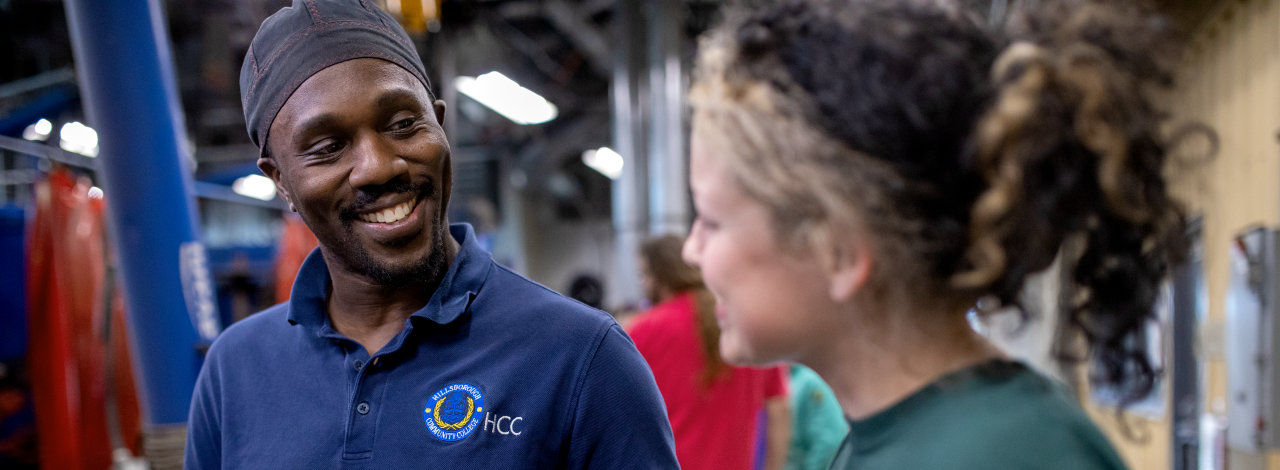 Workforce instructor having a conversation with a student.